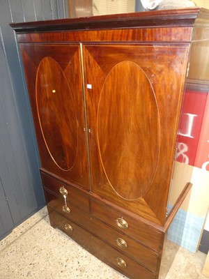 Lot 624 - A 19th century mahogany linen press (now...