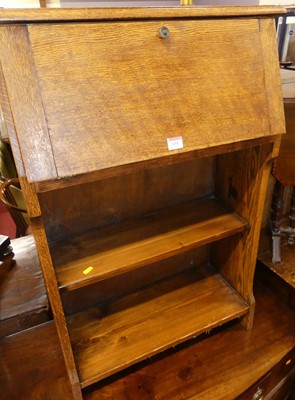 Lot 651 - A 1930s oak student's bureau, width 61cm