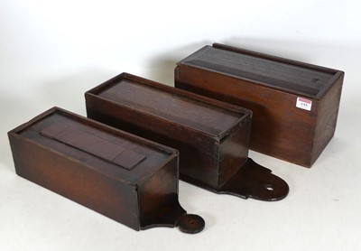 Lot 155 - A 19th century oak candle box, having a shaped...
