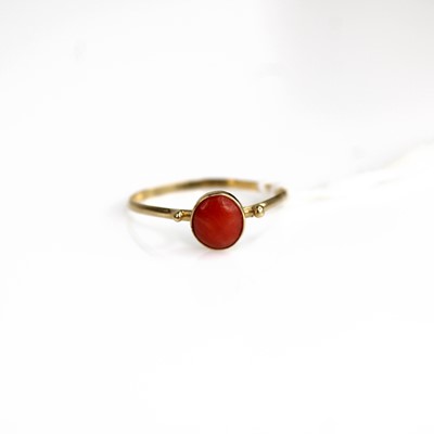 Lot 297 - A yellow metal coral set dress ring, unmarked...