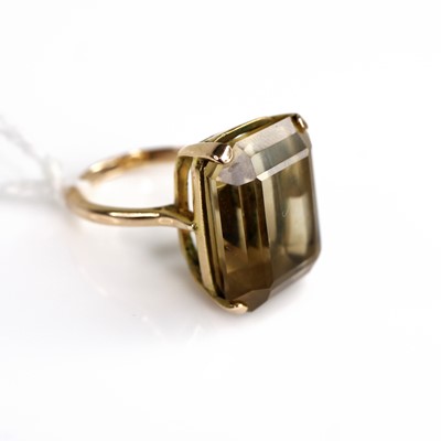 Lot 301 - A modern 9ct gold smoky topaz set dress ring,...