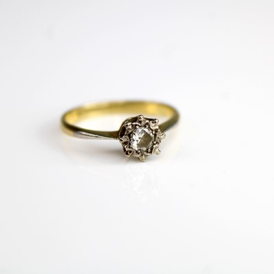 Lot 303 - An 18ct gold diamond solitaire ring, the...