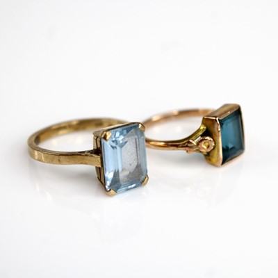 Lot 304 - A 9ct gold aquamarine set dress ring, as a...