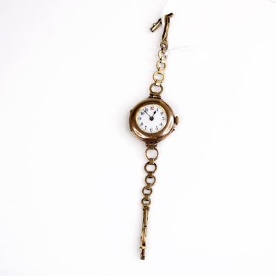 Lot 310 - A vintage lady's 9ct gold cased manual wind...