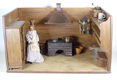 Lot 165 - A doll's kitchen diorama, w.66cm, together...