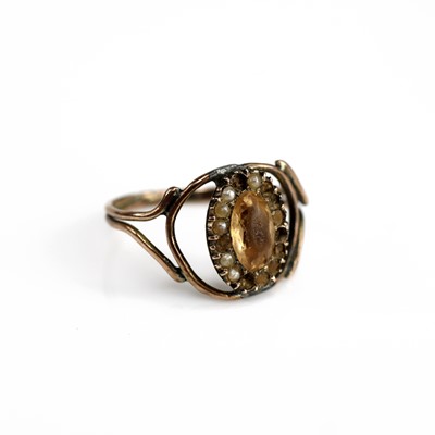 Lot 312 - A 19th century yellow metal, quartz and seed...