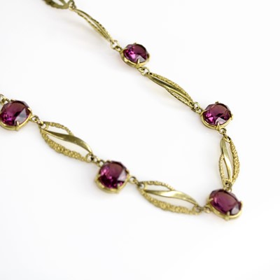 Lot 330 - A gilt metal and paste set necklace, 45cm