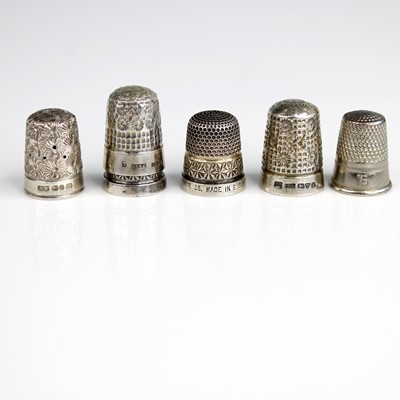 Lot 319 - Five various silver thimbles; together with a...