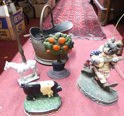 Lot 183 - A novelty cast iron door stop in the form of a...