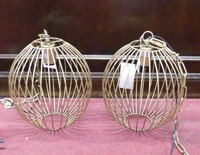 Lot 189 - A pair of contemporary gilt painted wirework...