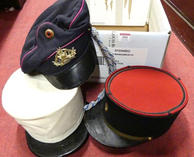 Lot 193 - A collection of hats, to include a German fire...
