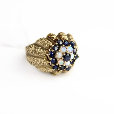 Lot 329 - A modern 9ct gold, sapphire and opal set...