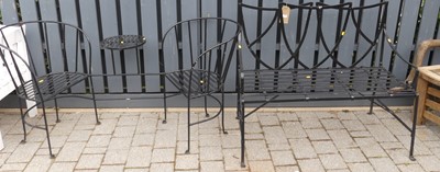 Lot 758 - A black painted strapwork wrought metal...