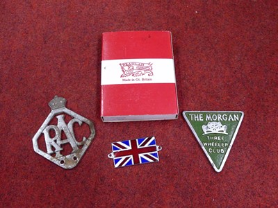 Lot 264 - A collection of automotive badges, to include...