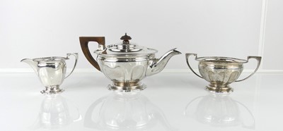 Lot 265 - An Art Deco silver three-piece tea set,...
