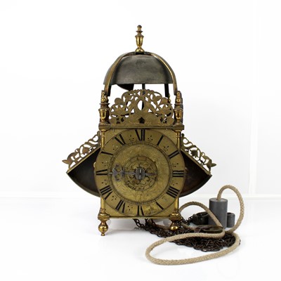 Lot 289 - A late 17th century English brass verge winged...