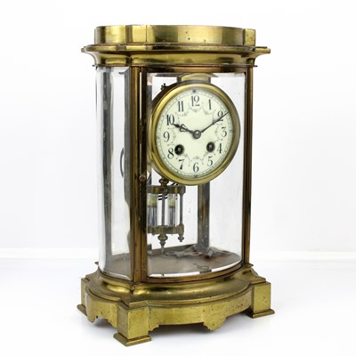Lot 280 - A circa 1900 lacquered brass mantel clock the...