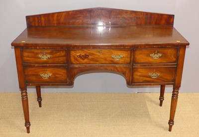 Lot 674 - A Victorian mahogany ledgeback kneehole...