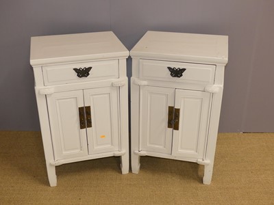 Lot 671 - A pair of Oriental hardwood and light later...