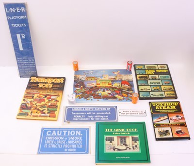 Lot 109 - A collection of books and repro metal signs:...