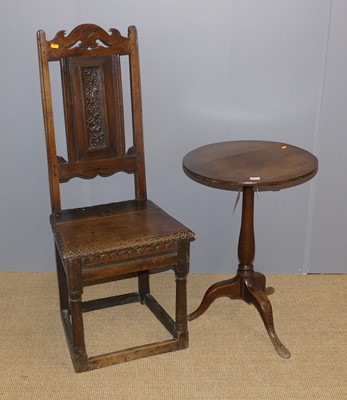 Lot 668 - A circa 1800 provincial oak circular pedestal...