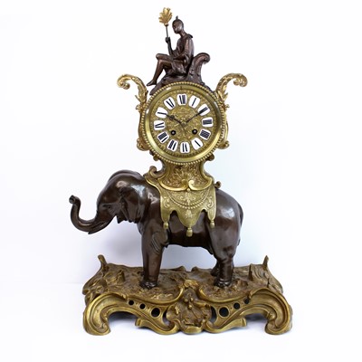 Lot 283 - A bronze and gilt-bronze mantel clock in the...
