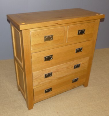 Lot 655 - A contemporary joined blond oak square front...