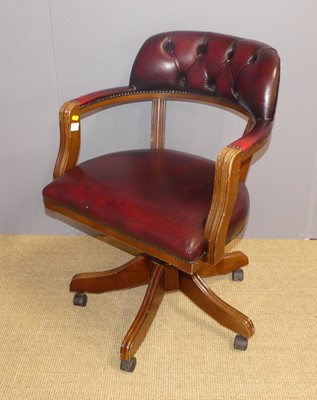 Lot 688 - A contemporary mahogany, ox-blood red leather...