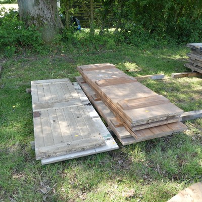 Lot 566 - Six various pine tongue and groove doors,...