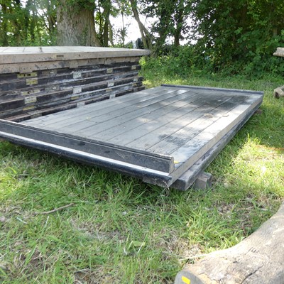 Lot 568 - A pair of black painted pine sliding room...