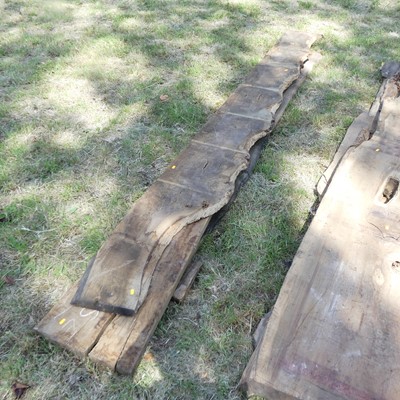 Lot 534 - Three sawn timber plank sections, probably oak,...
