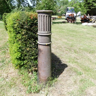 Lot 595 - A pair of glazed terracotta 5ft cylindrical...