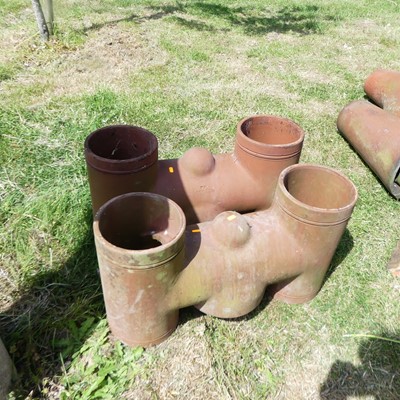 Lot 600 - A pair of patent No.409886 terracotta double...