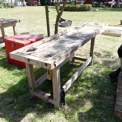 Lot 570 - A wooden work bench