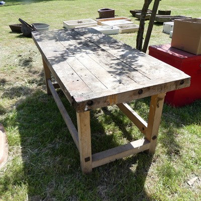 Lot 571 - A wooden work bench