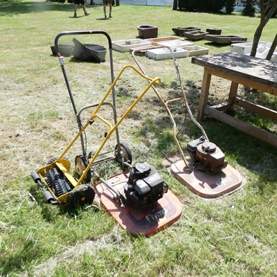 Lot 336 - A Briggs & Stratton petrol-driven flymo;...