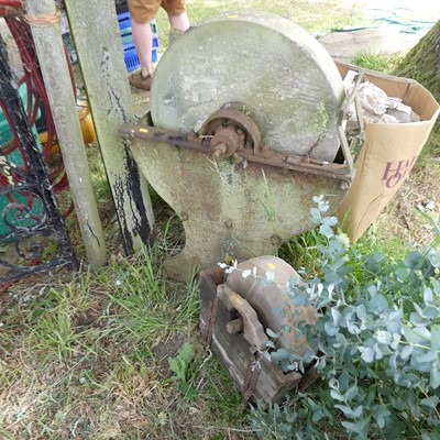 Lot 412 - A cast iron and stone knife-grinding wheel,...