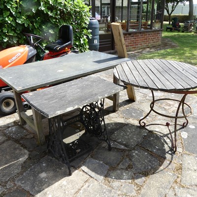 Lot 674 - A garden table, having a polished slate...