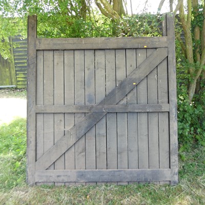Lot 577 - A pair of black painted wooden gates, each 83...