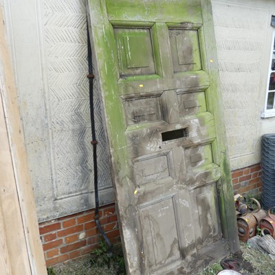 Lot 578 - An oak external panelled door, 89 x 45"