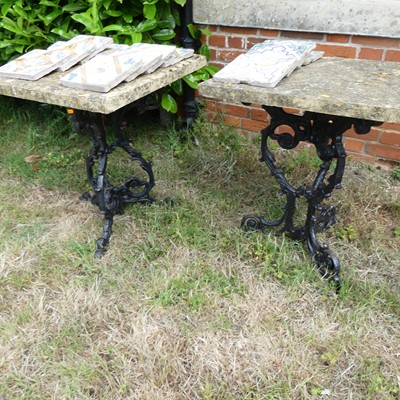Lot 671 - A pair of patio tables, each having...