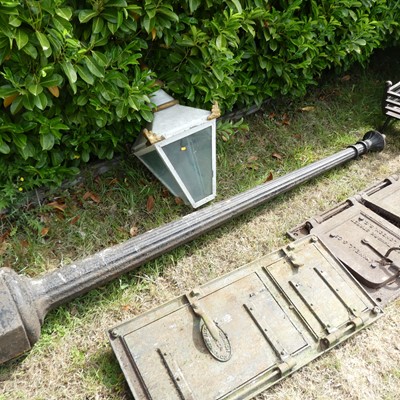 Lot 626 - A cast iron street lamp, with associated lantern