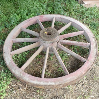 Lot 688 - A single coopered oak and iron bound cartwheel,...