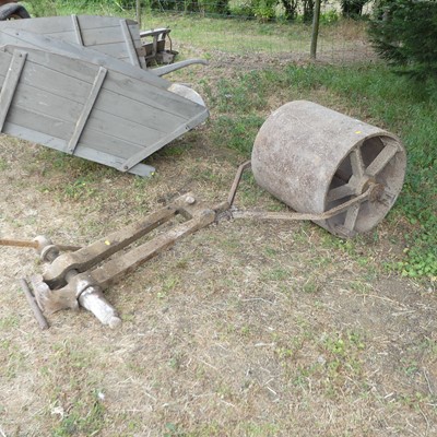 Lot 706 - A cast iron garden roller; together with a...