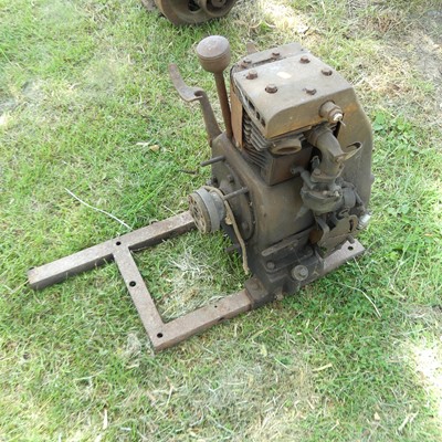 Lot 860 - A Briggs & Stratton large cast iron single...