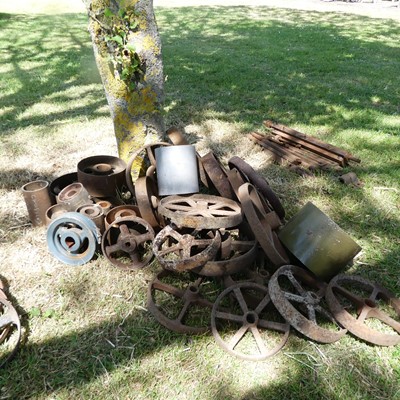 Lot 685 - A large quantity of mixed cast iron wheels,...