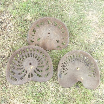 Lot 691 - A collection of three vintage cast iron...