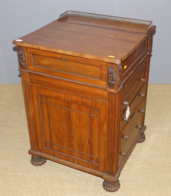 Lot 701 - A mid-19th century possibly padouk hinged top...