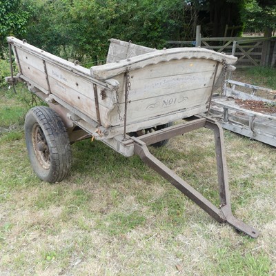 Lot 701 - A single axle wooden tumbrel cart/trailer with...