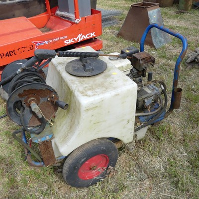Lot 418 - A petrol driven pressure washer on wheels